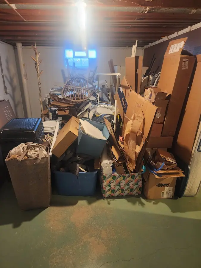 Roll-off dumpster container at job site for 15 Yard Dumpster Rental in Douglasville